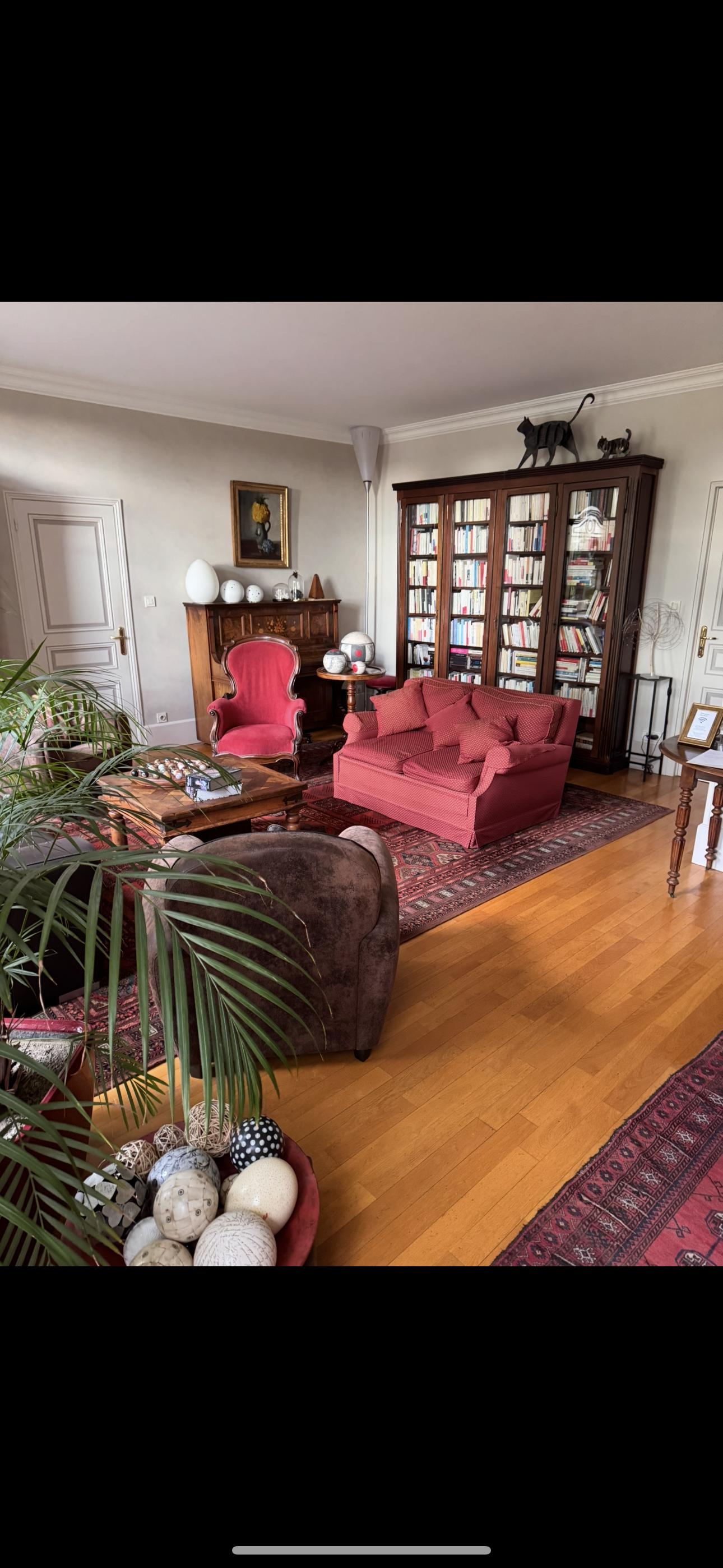 The living room you walk by to get to your room.  Lots of books to read…but in French…