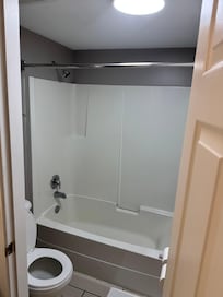 No shower curtain