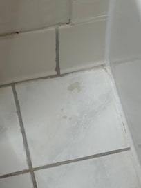 Another picture of a dirty bathroom.