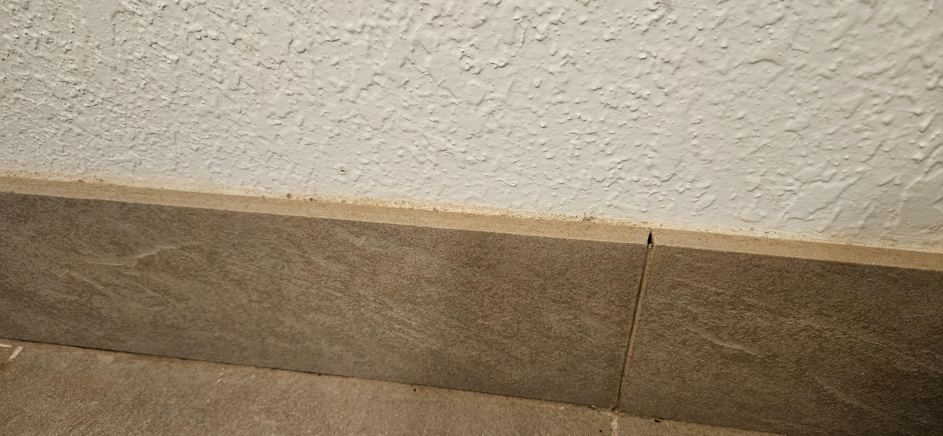 Dirty skirting and tile grout