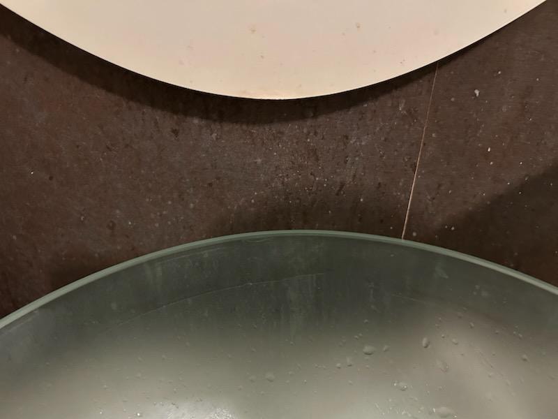 Dirty wall behind sink