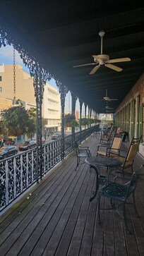 Private covered balcony only accessible through the a few select rooms on the 2nd floor.