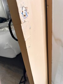 Sliding bathroom door with missing handle