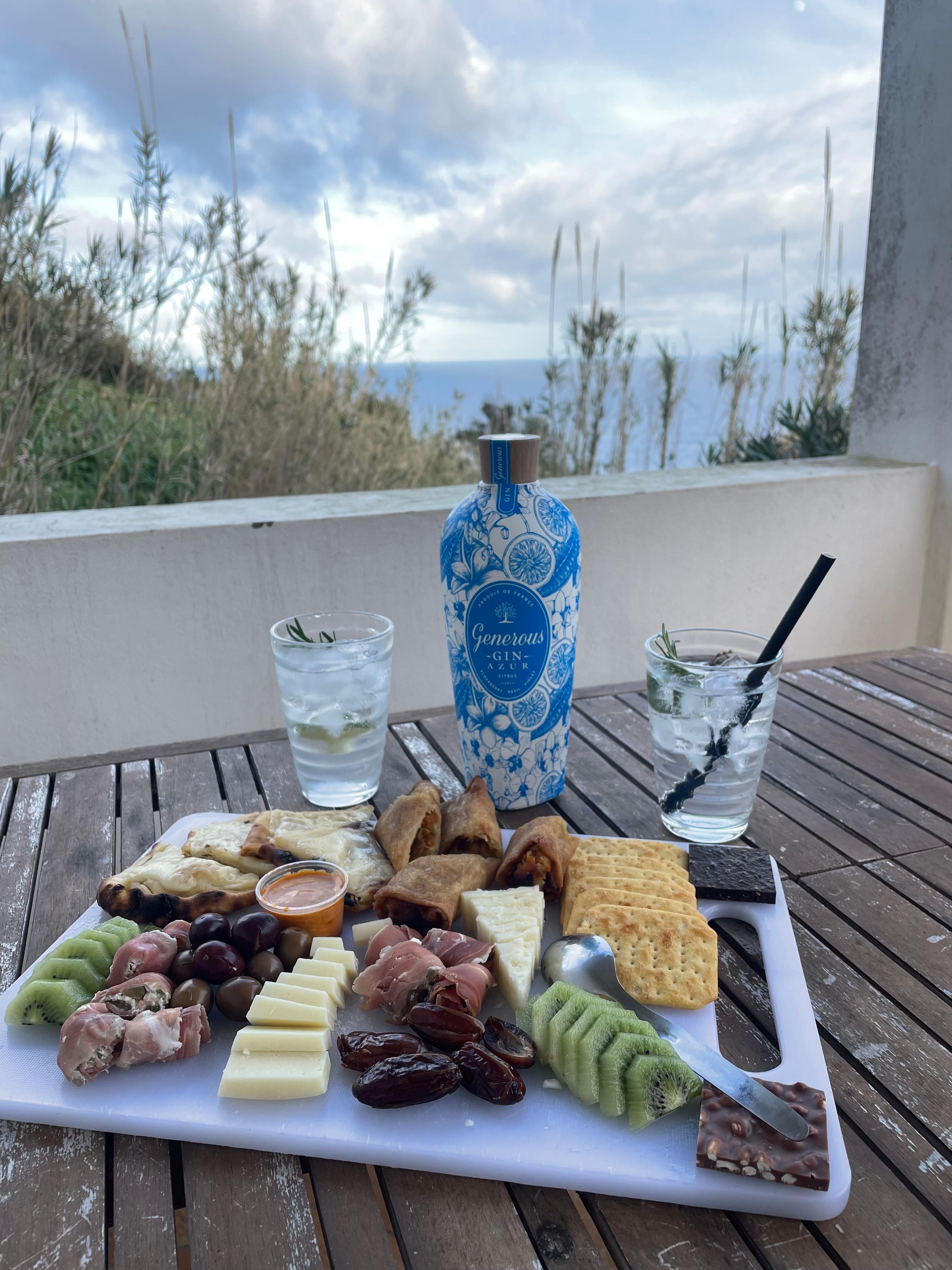 Enjoying a snack and drink from our view on patio. 