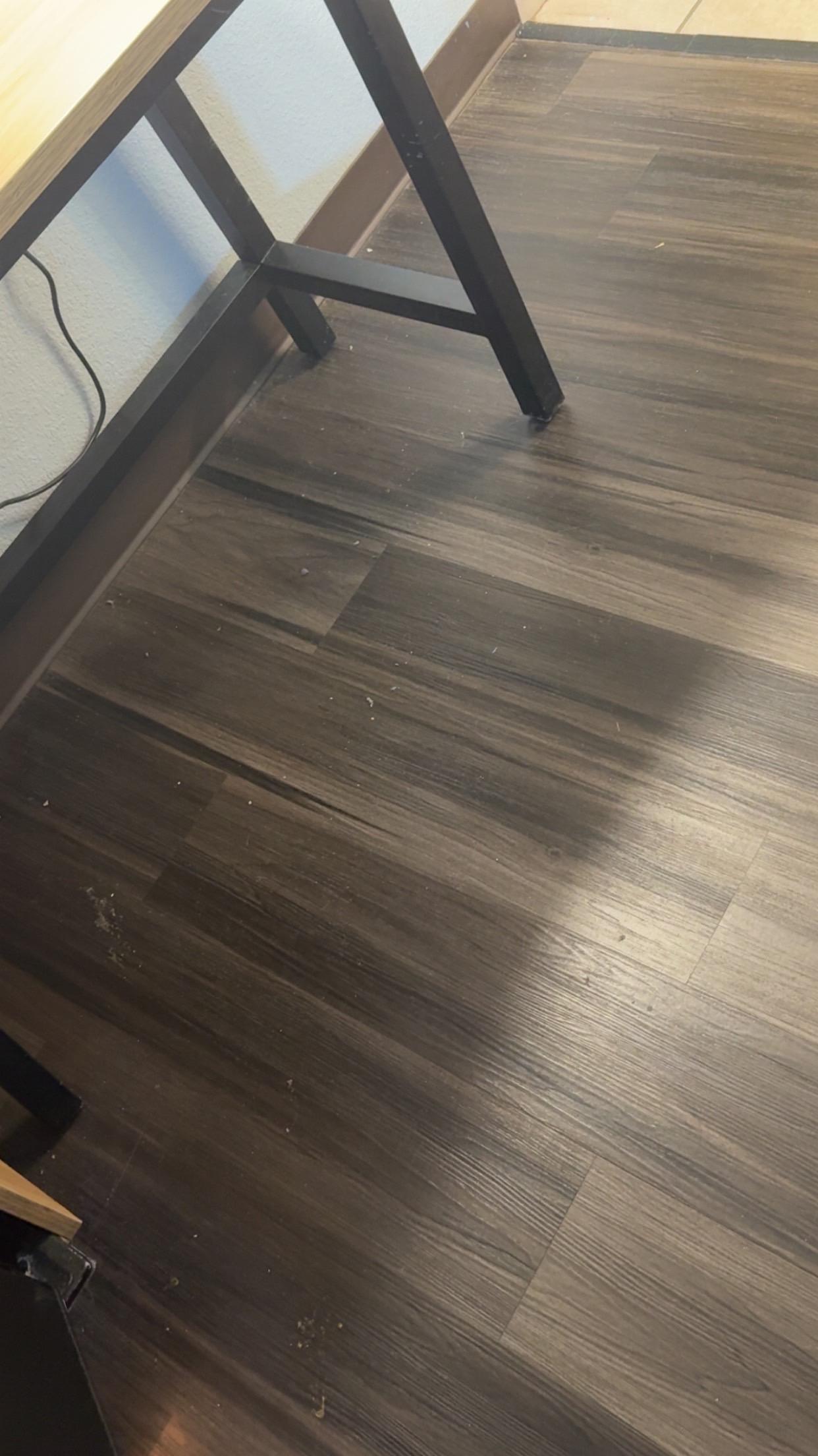 The whole room had dirt all over the floor that they clearly never swept