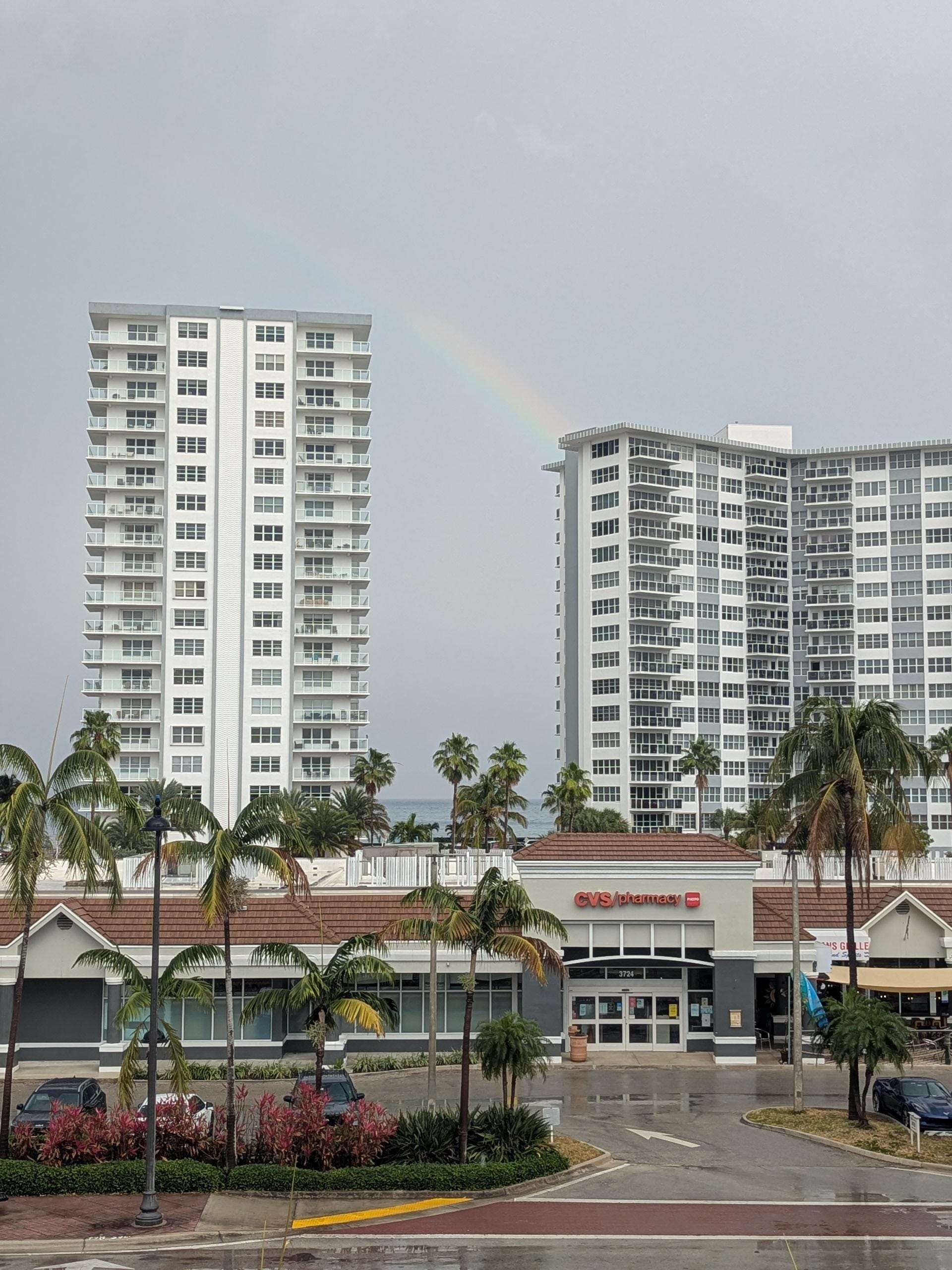 Caught a rainbow from the balcony after a storm!