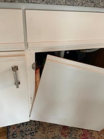 Kitchen cabinet door was broken.