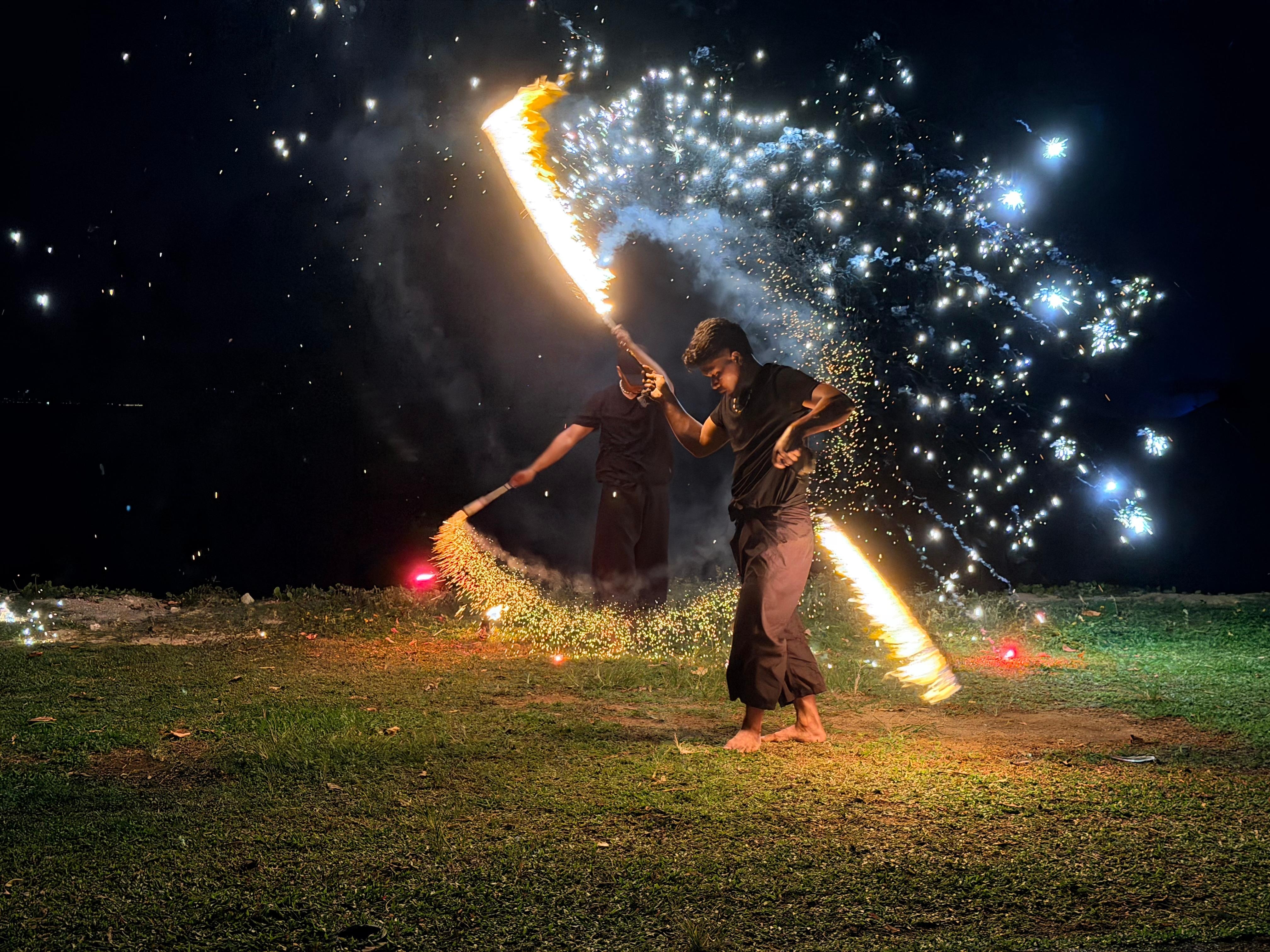 BBQ buffet with a fire show on the beach