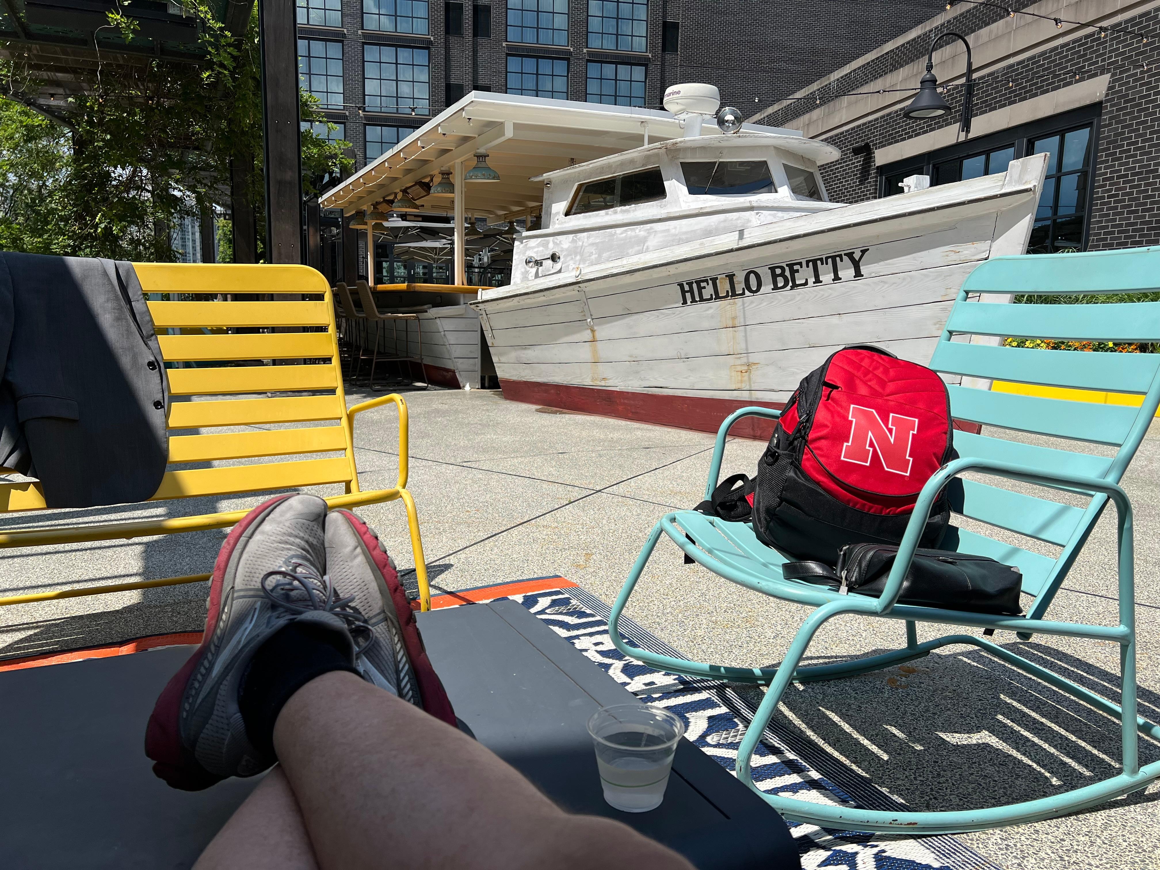 Part of the outdoor bar is a boat!
