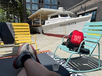 Part of the outdoor bar is a boat!