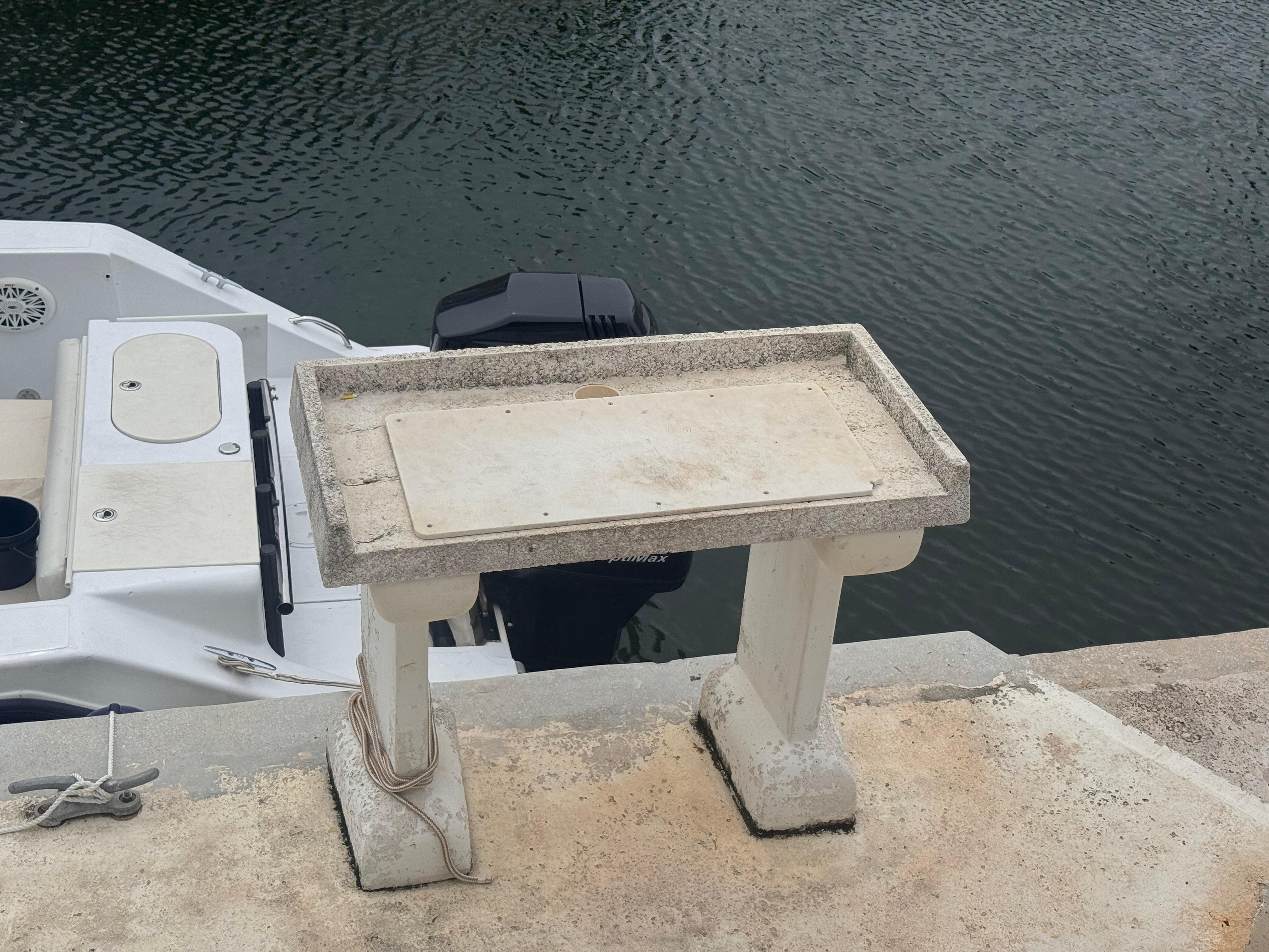 Loose cleat we had to hook to the concrete table. Other concrete table to eat broken afraid to fall in feet and accident to happen