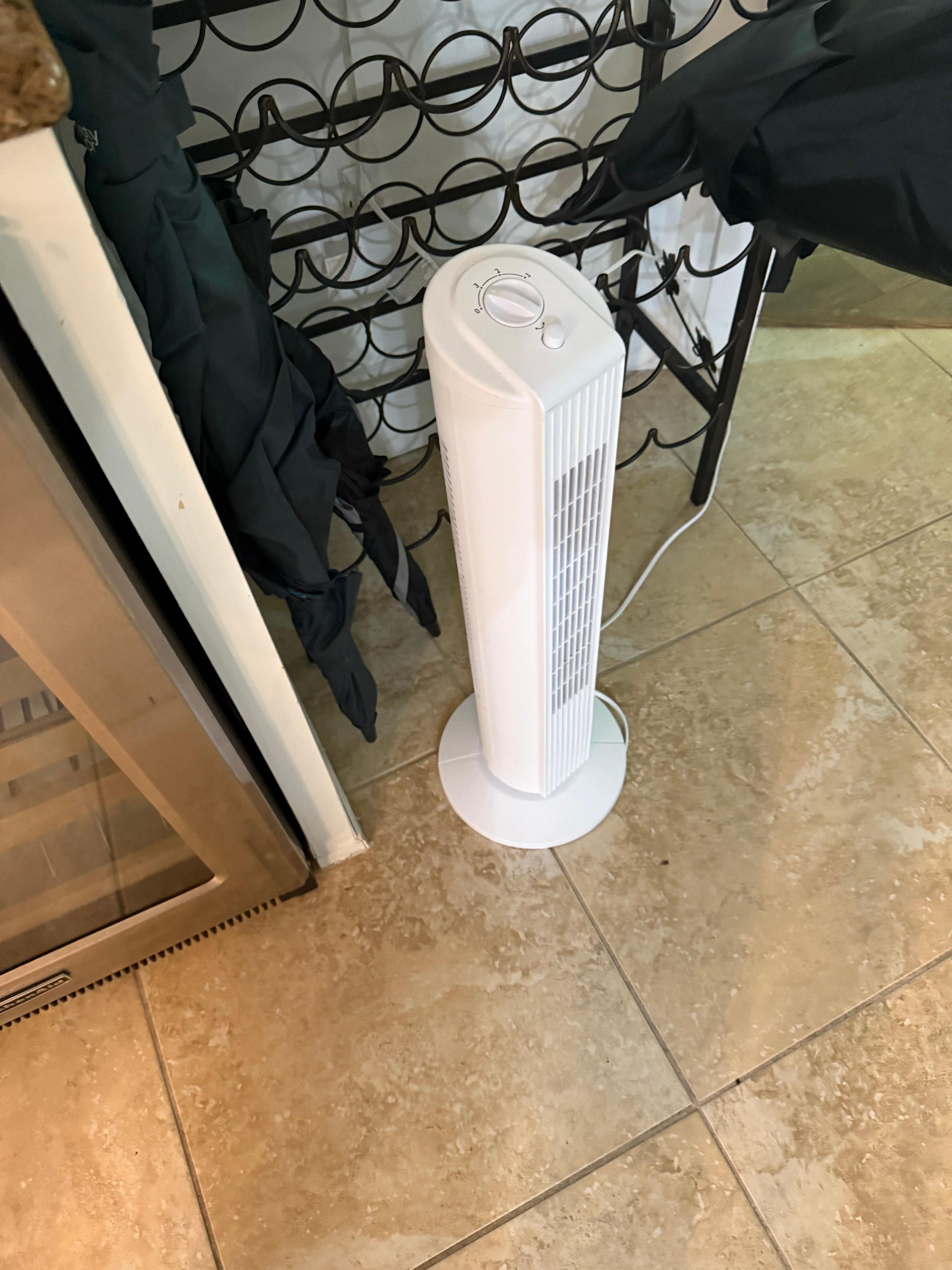 One of three fans to circulate air to keep the unit bearable 