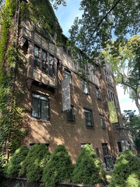 Outside of building. Notice the rental agency and the bike racks.