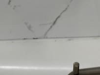 Mold at bottom of tiles