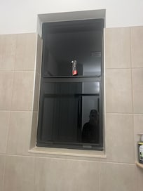 See through window in master shower. Had to shower in the dark for privacy