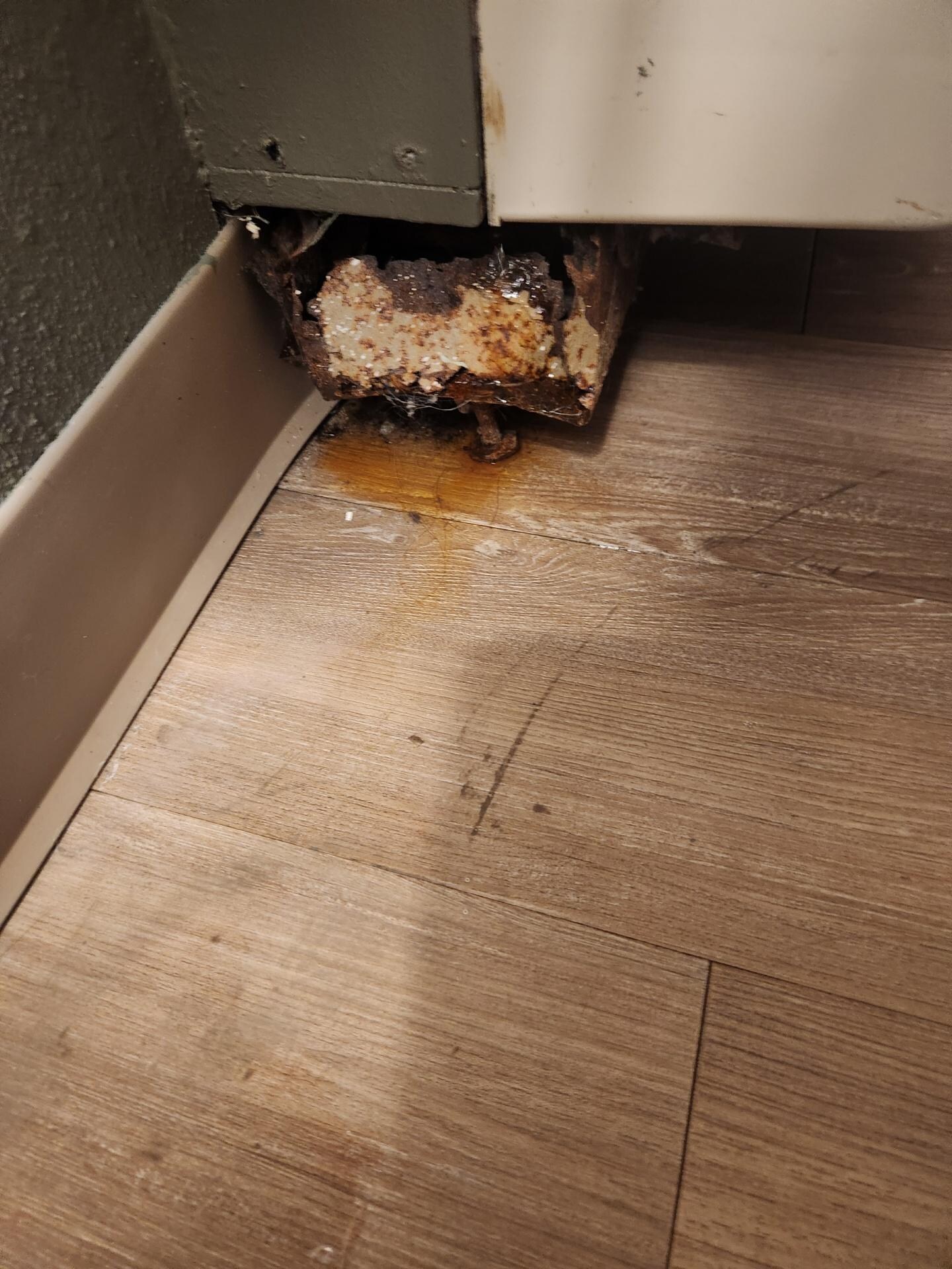 Under air conditioning unit in room