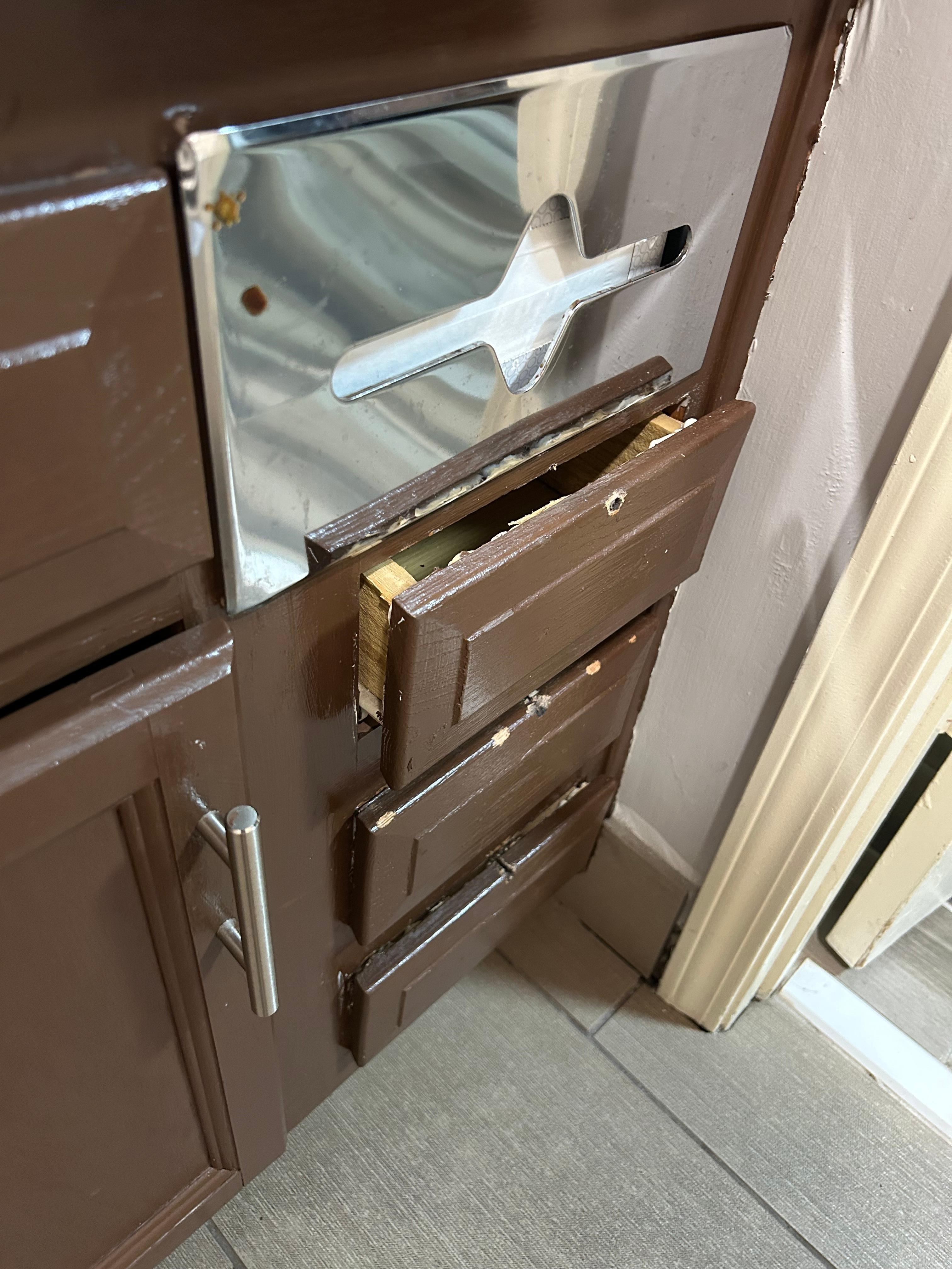 This is the condition of the bathroom drawers.