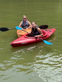 2 of the sit-in style kayaks that were provided.