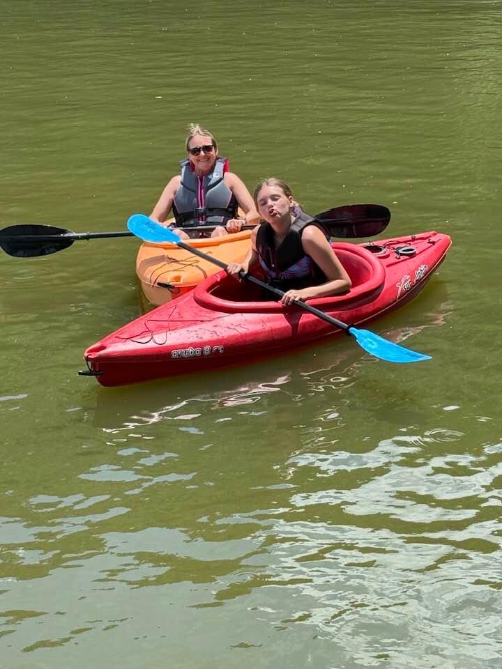 2 of the sit-in style kayaks that were provided.