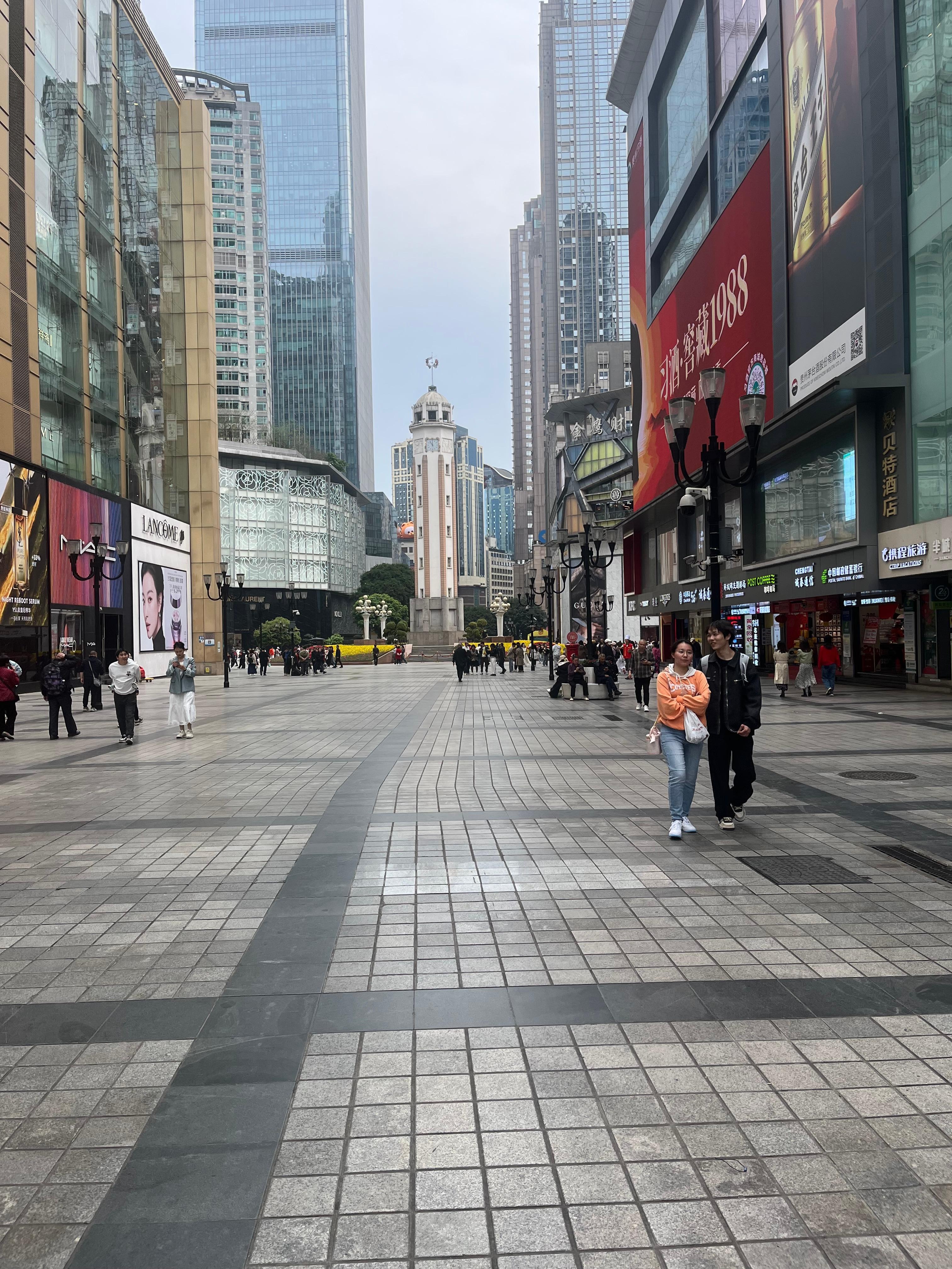 The entrance to the  square around the Hotel every imaginable thing goes on here very crowded all day long covers 2 blocks at least center around the People’s Liberation Monument one of many around the country.
