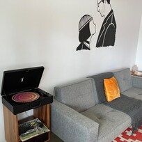 The rooms have a record player and a vinyl library in the lobby.