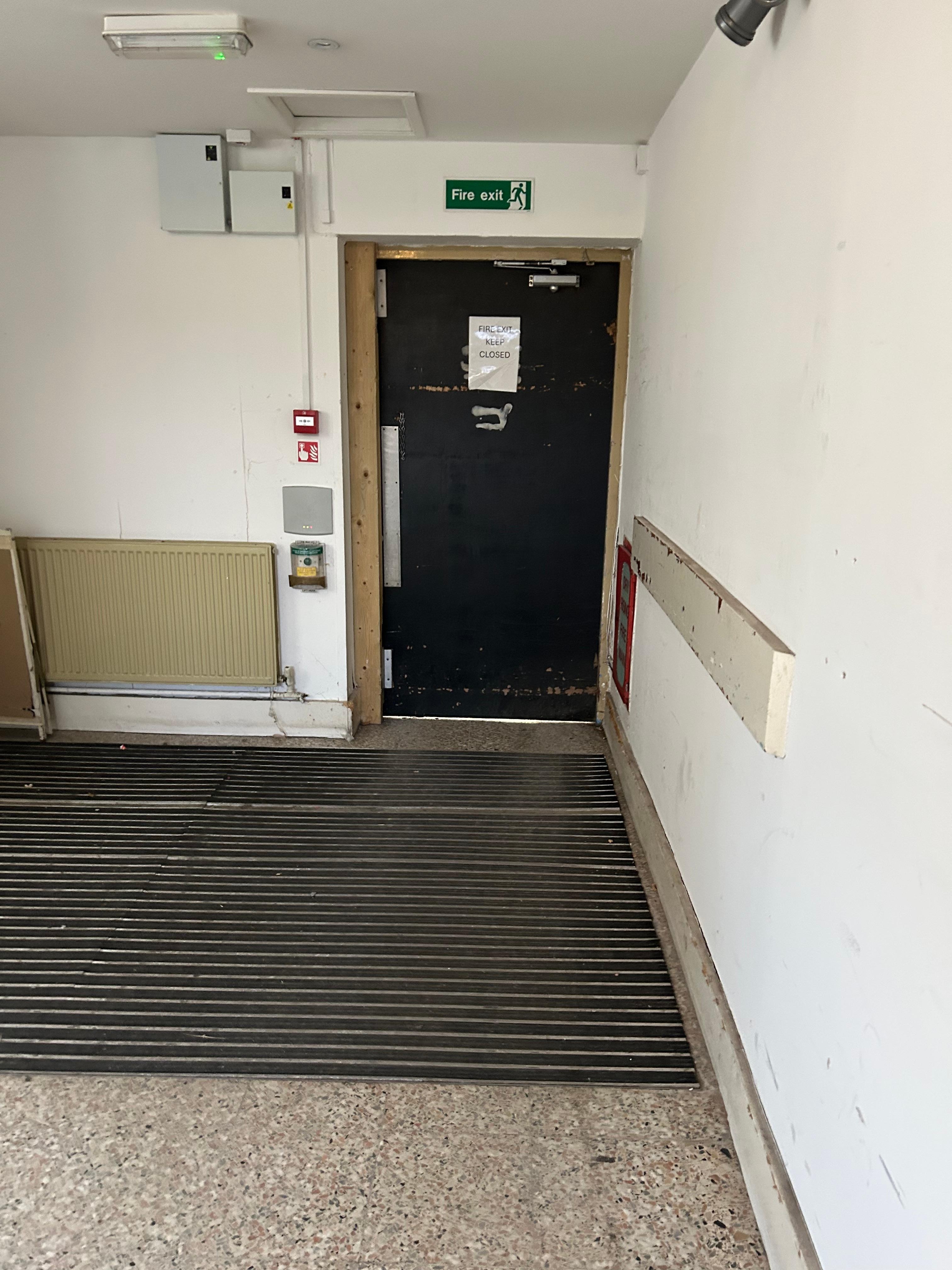 Padlocked fire door. 