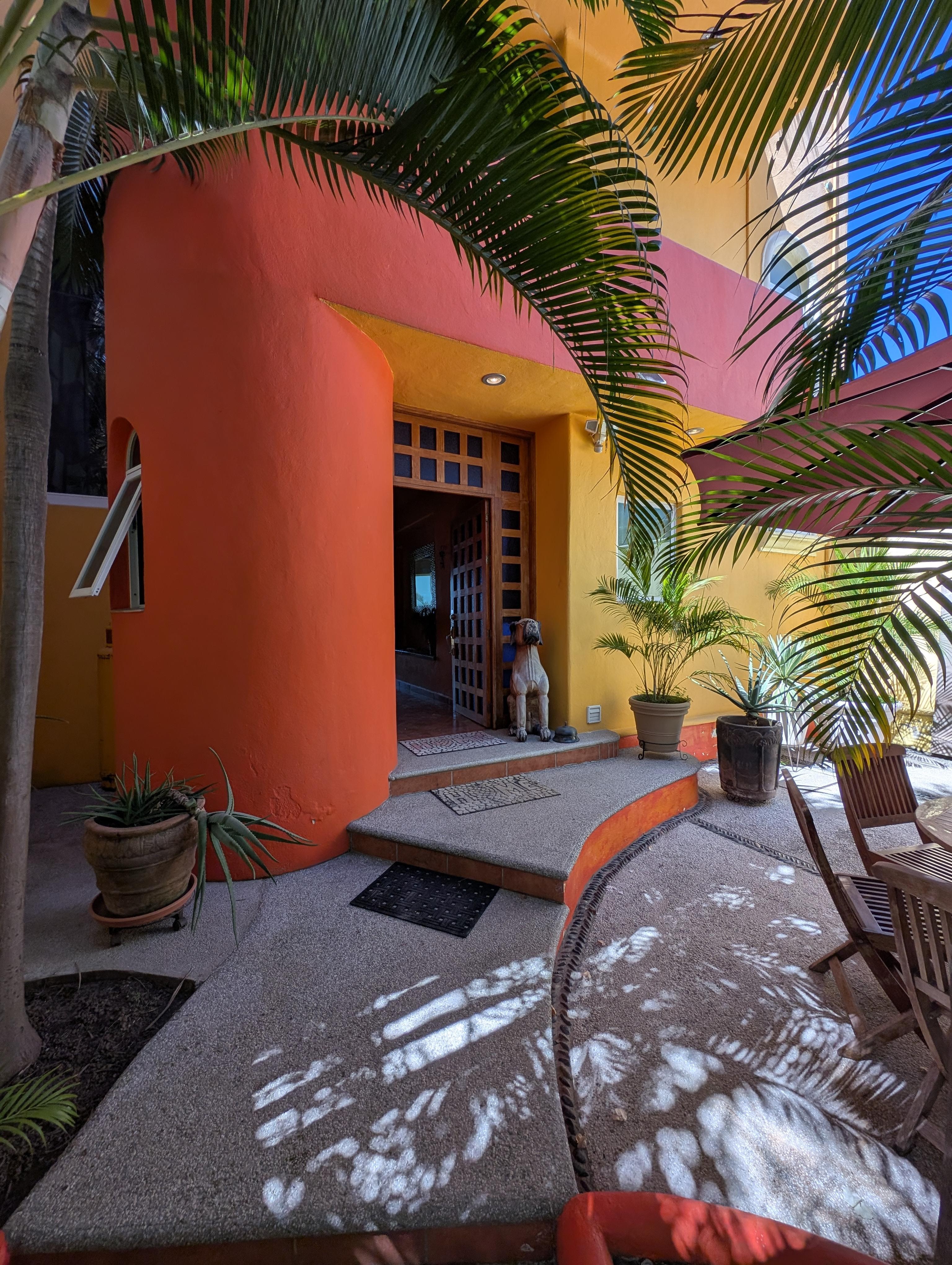 Front entrance past outdoor gate.