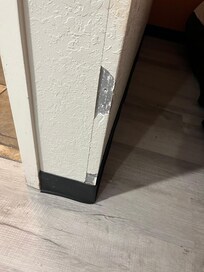 Chips in paint throughout room