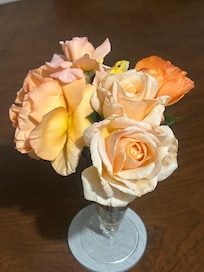 Beautiful scented roses on the dining table.