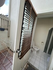 Louvered back door.
