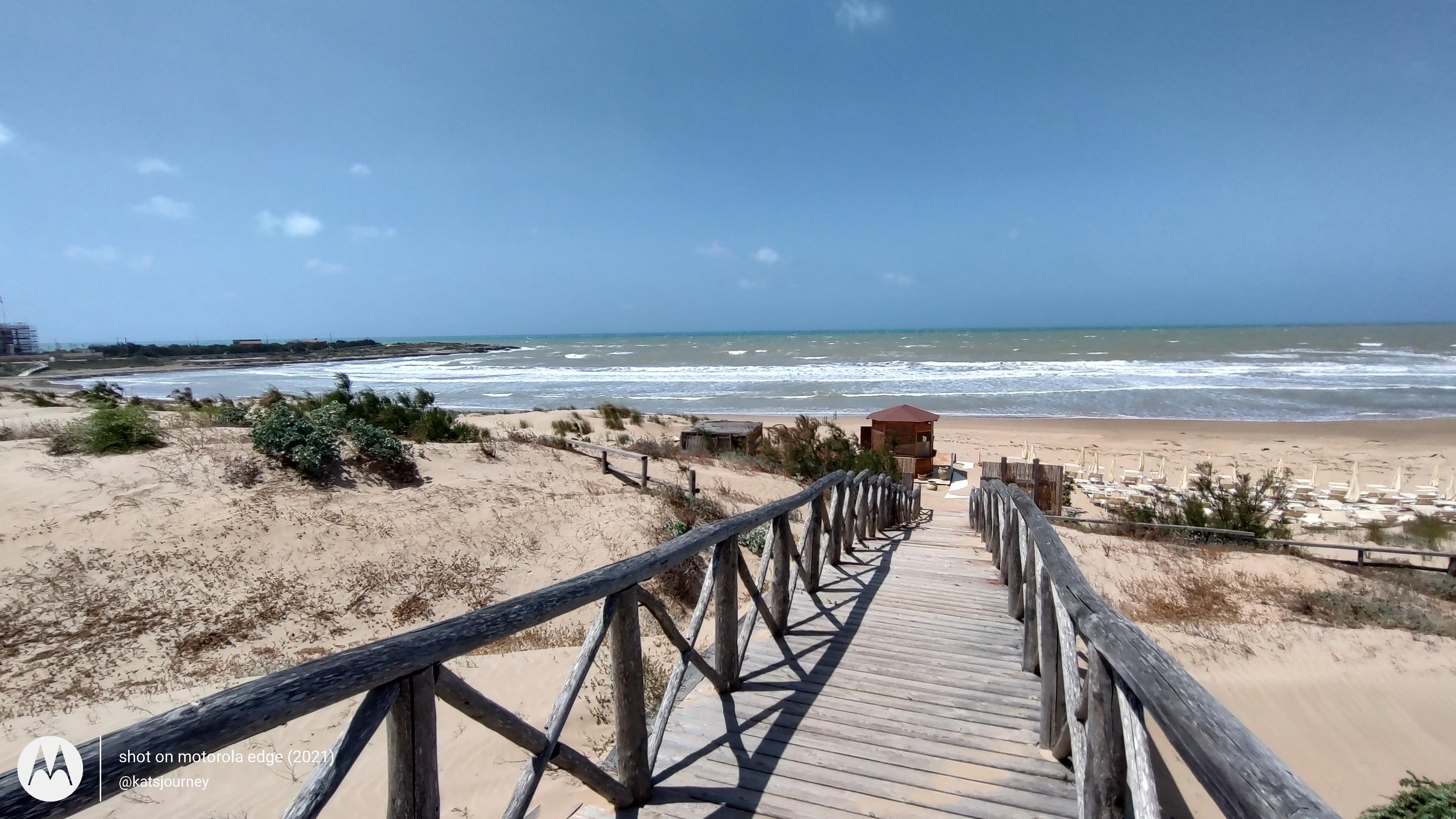 The walkway to the beach over the sand dunes