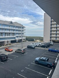 Right past the cars is the path to the beach