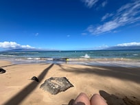 The beach in front of the home at low tide