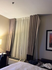 wrinkled curtains off the hooks