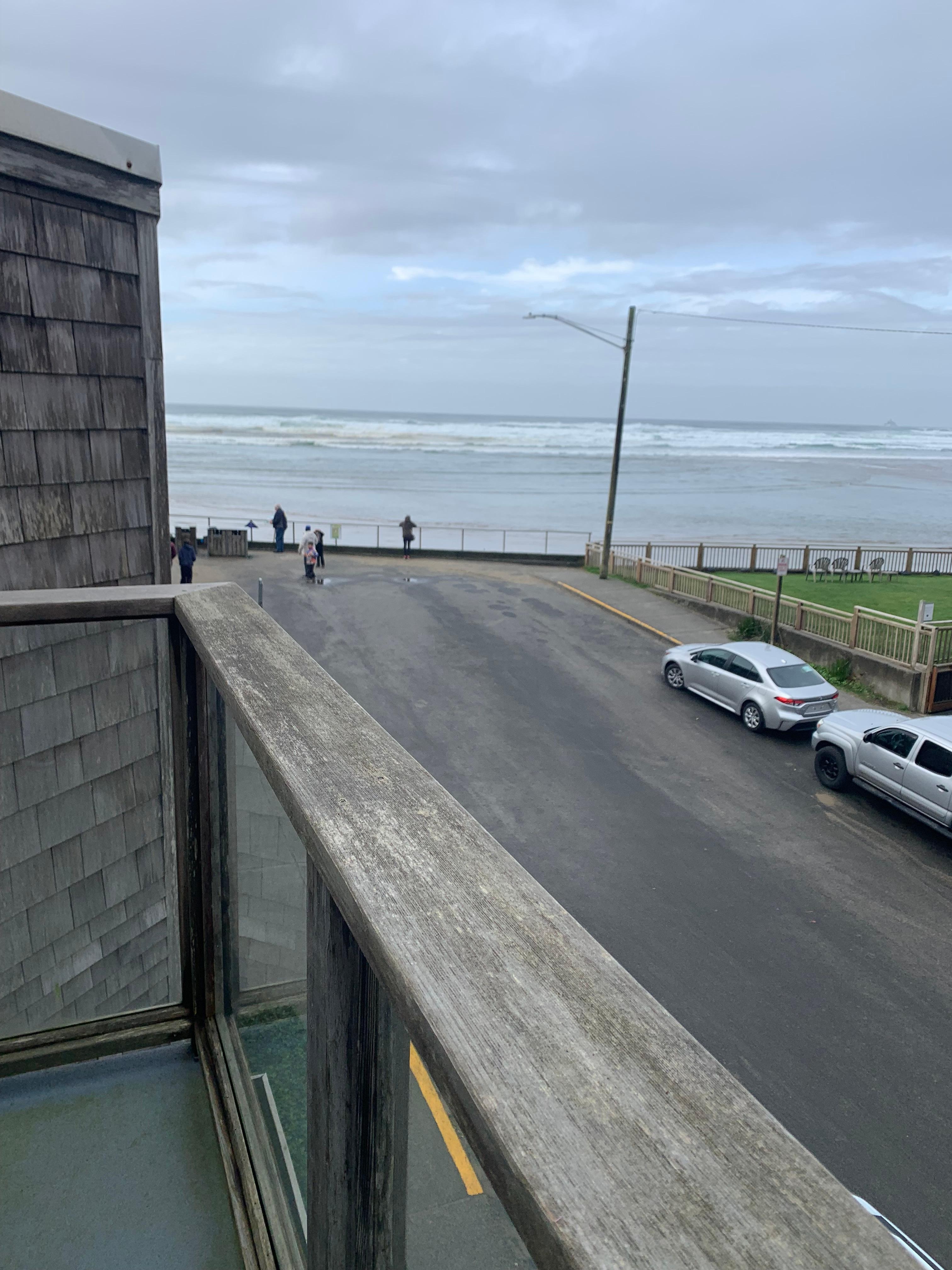 Private balcony on third floor. The river and ocean were mesmerizing to watch. There are two Adirondack chairs out there.