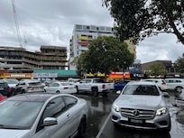 Street across the apartments where eateries and restaurants are