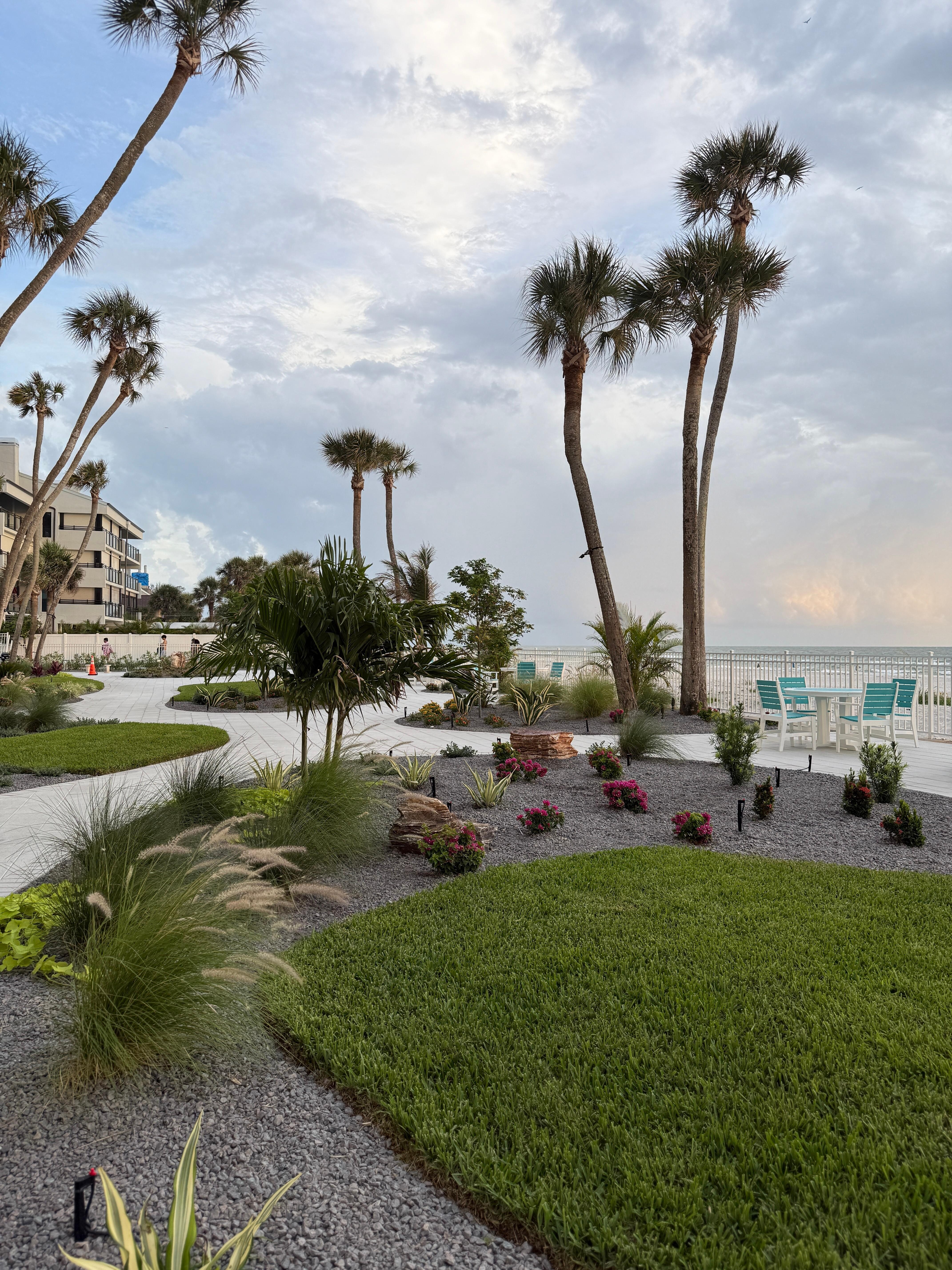 The terrace area near the pool/beach access gate. 