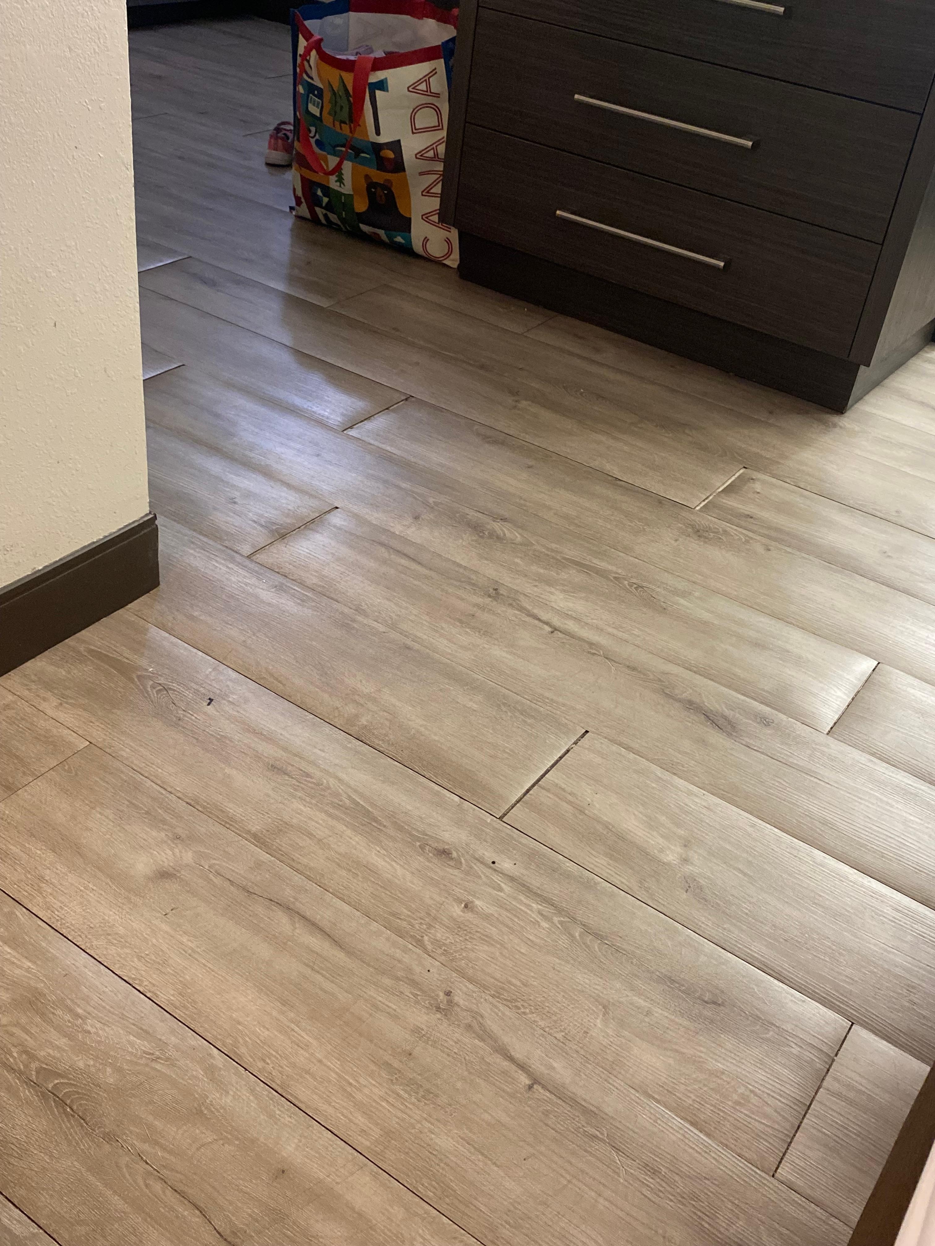 Floor panels were bubbling up, not even attached to the floor and sticky. 