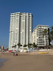 View of condo complex from the beach. Condo is 16th floor on taller tower.