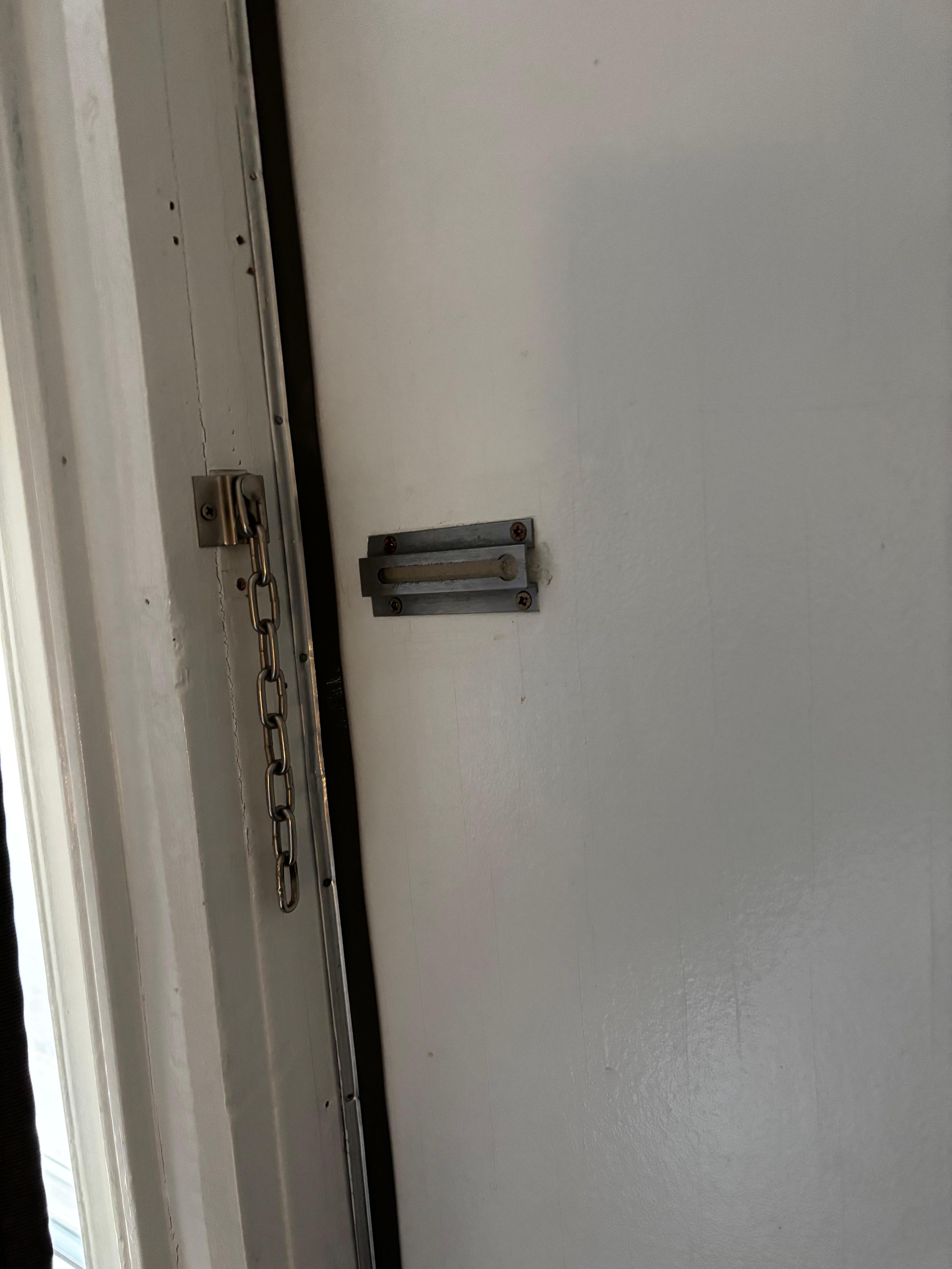 Door that opens out, not in and the missing lock. 