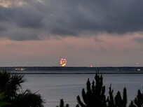 Watching fireworks from the balcony.
