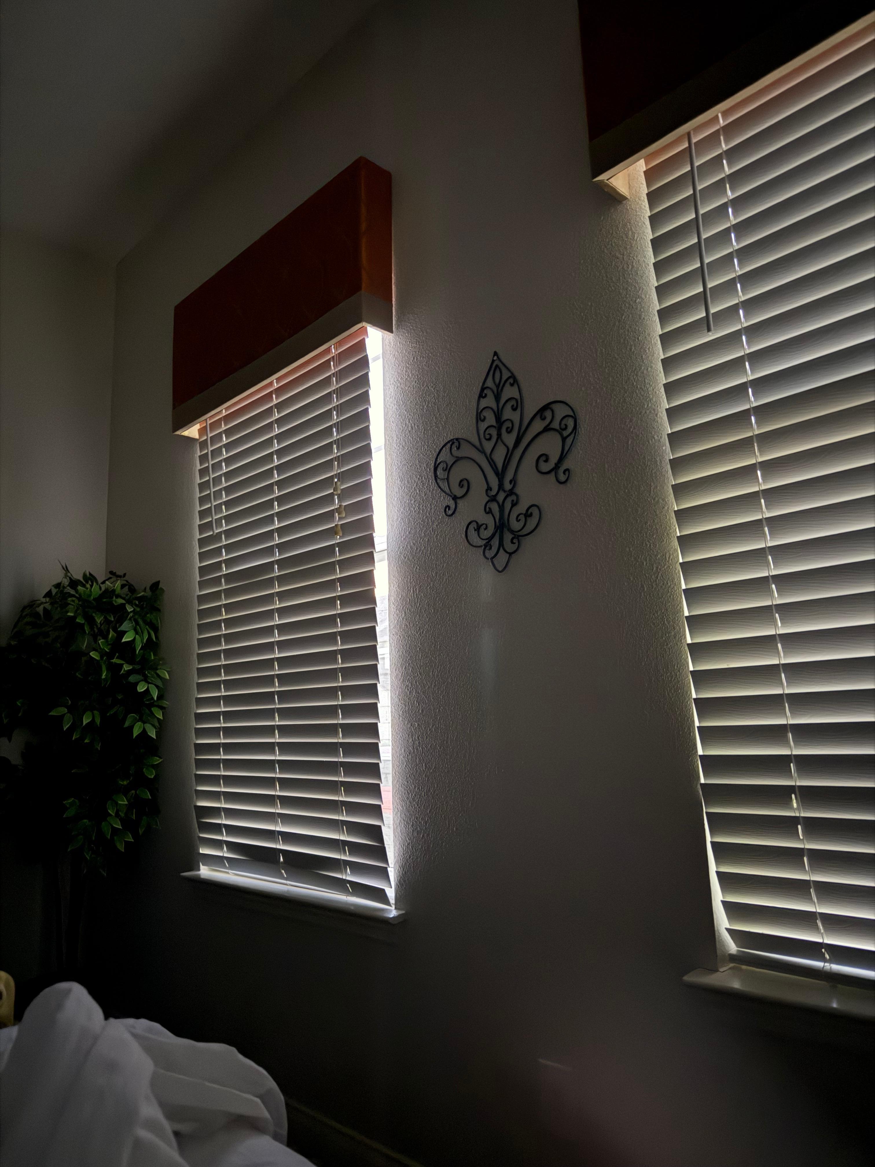 This is gap in blinds after trying to shove them inside window to close gap