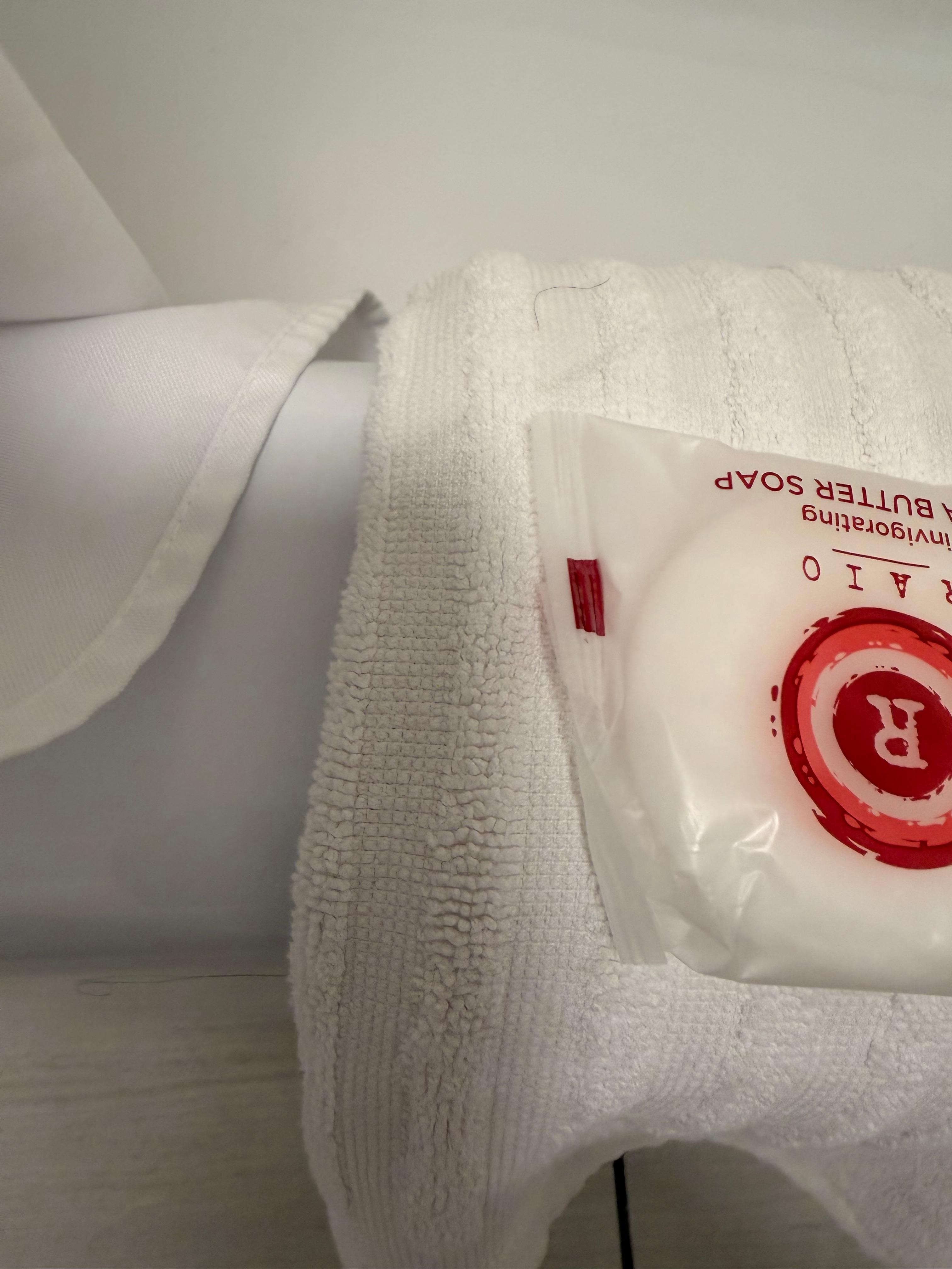 Hairs on towel and tub (hard to see in picture)