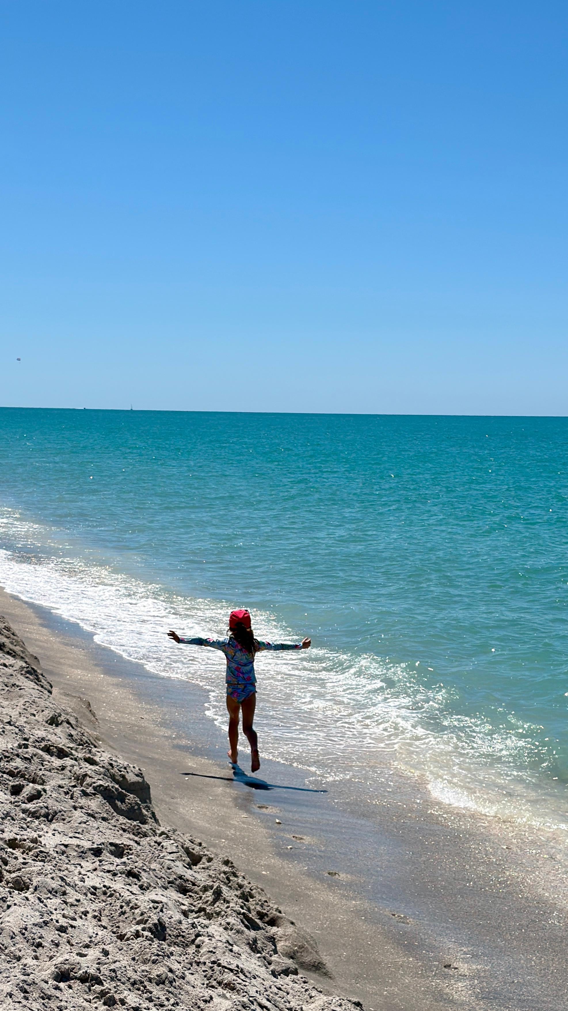 Exploring the beach, hunting for sharks teeth
