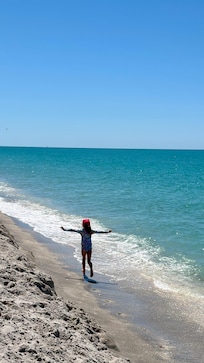 Exploring the beach, hunting for sharks teeth