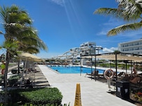Quiet pool with the adult slides behind it