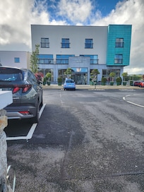 Front of hotel, lots of parking