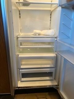 refrigerator was frozen over...  barely kept anything cold! 