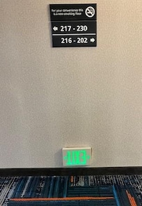 Exit Sign upside down.