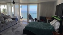 Living room (master bed) with balcony behind